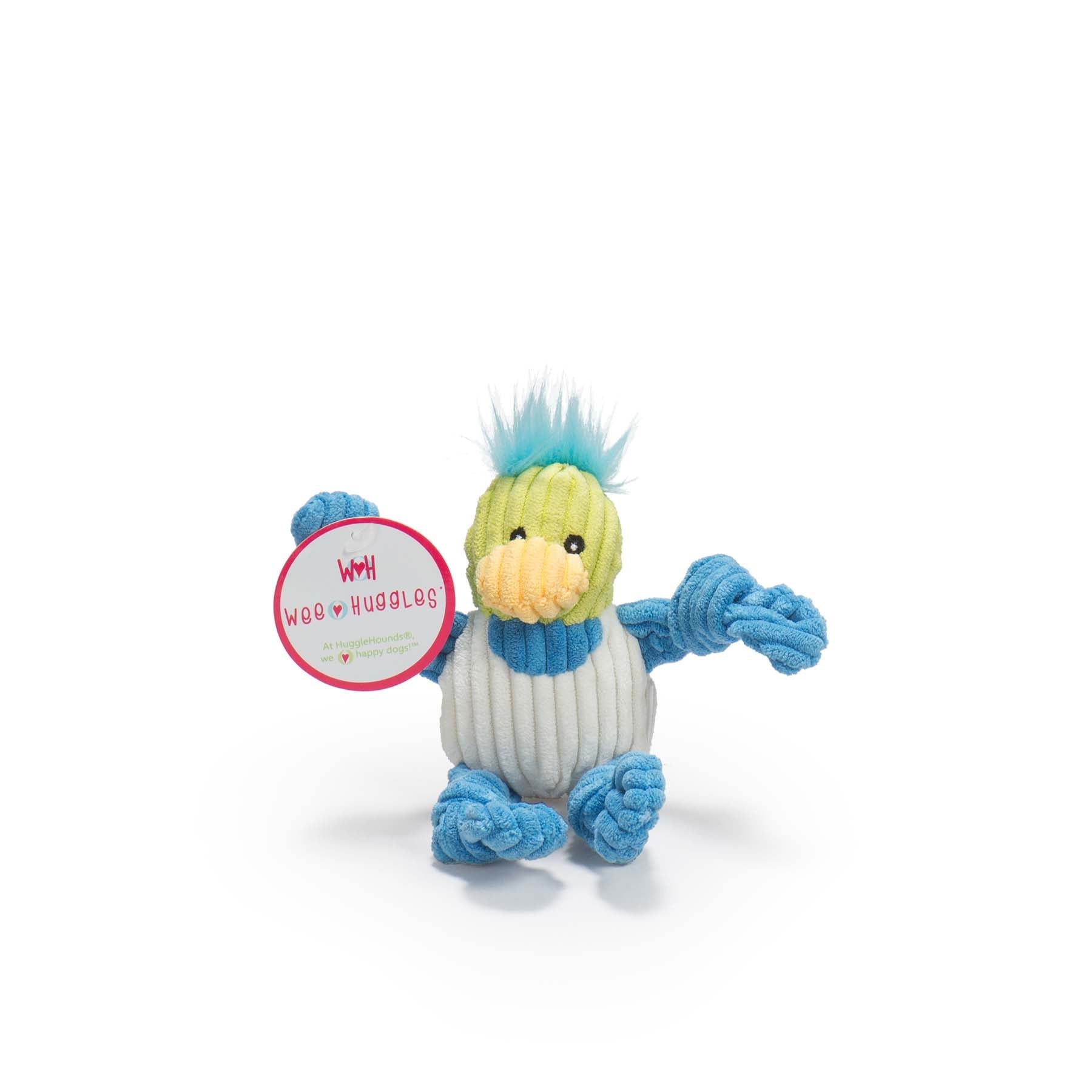 Image of the duck facing the camera. The duck has blue fur on the top of it's head, with a green head. Black eyes, white pupils, and a yellow beak. The Duck has knotted blue arms and legs with blue fur around it's neck and a white furred chest.