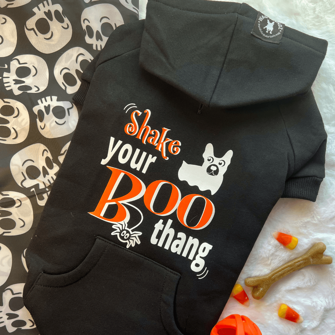 Hooded Sweatshirt For Dogs - Halloween - "Shake Your BOO Thang" hooded sweatshirt in black - back view has Shake your Boo thang in orange and white - skeleton dog and candy corn background - Wag Trendz