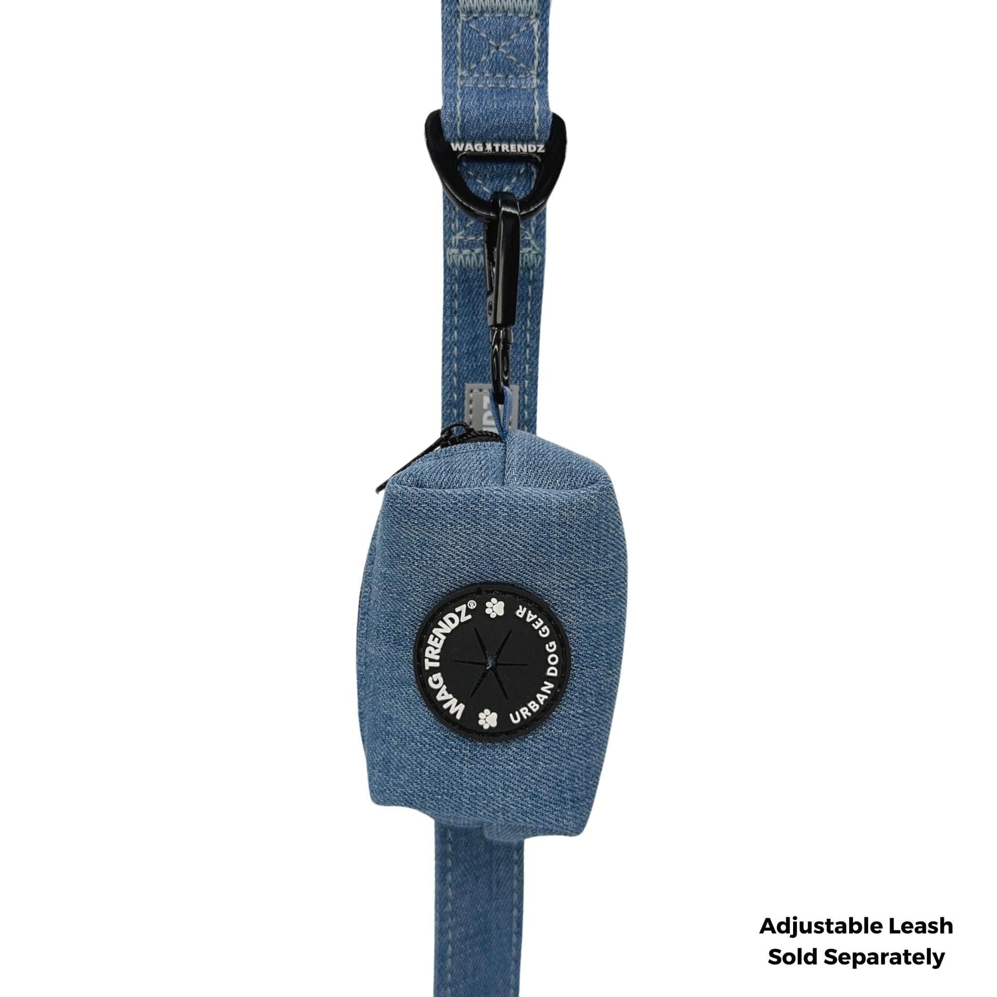 Dog Poop Bag Holder - Downtown Denim - hanging on a denim dog leash with the black rubber logo dispenser on front - against a solid white background - Wag Trendz