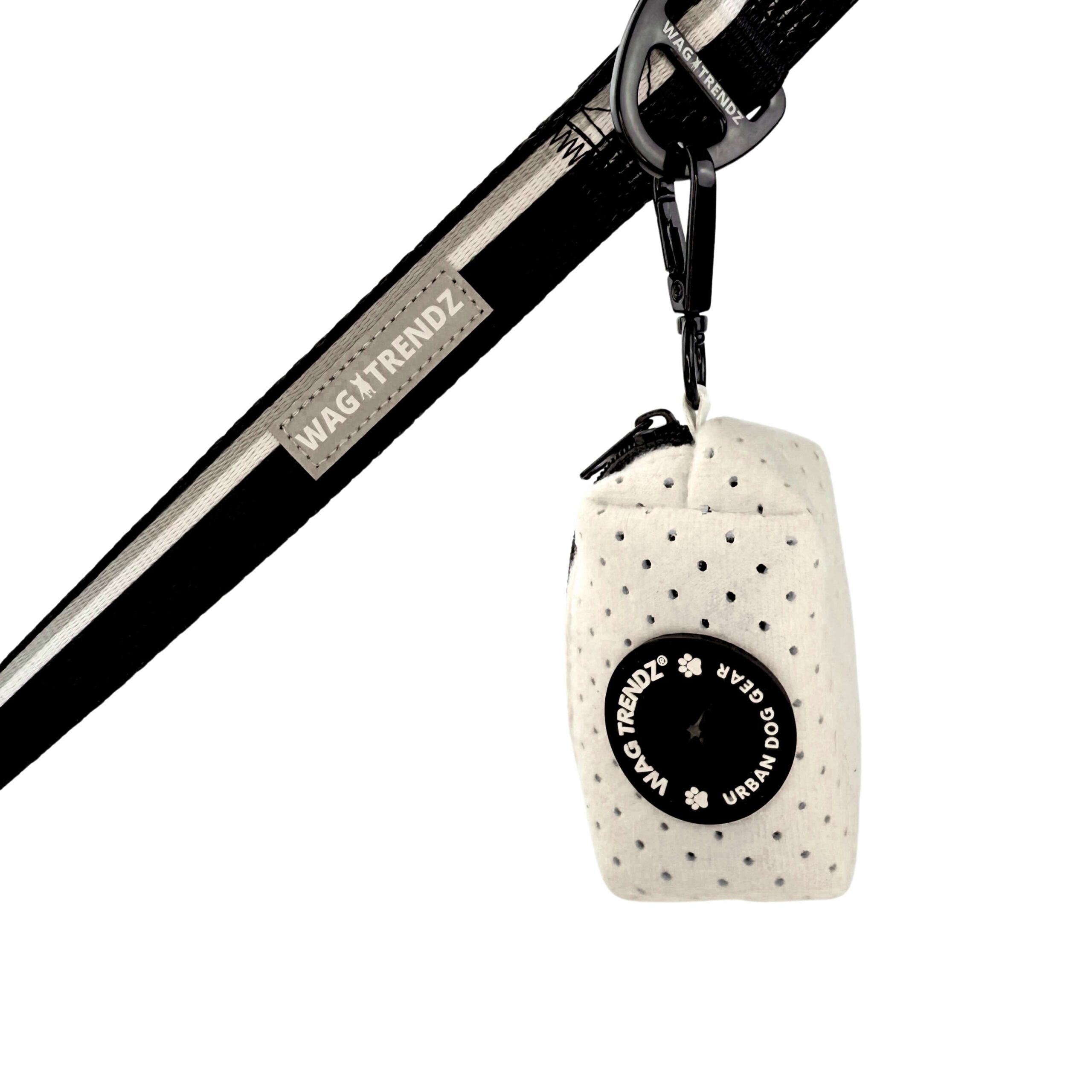 NeoCool™ Sport Poop Bag Holder in White with Black logo dispenser hanging on a black dog leash with white background