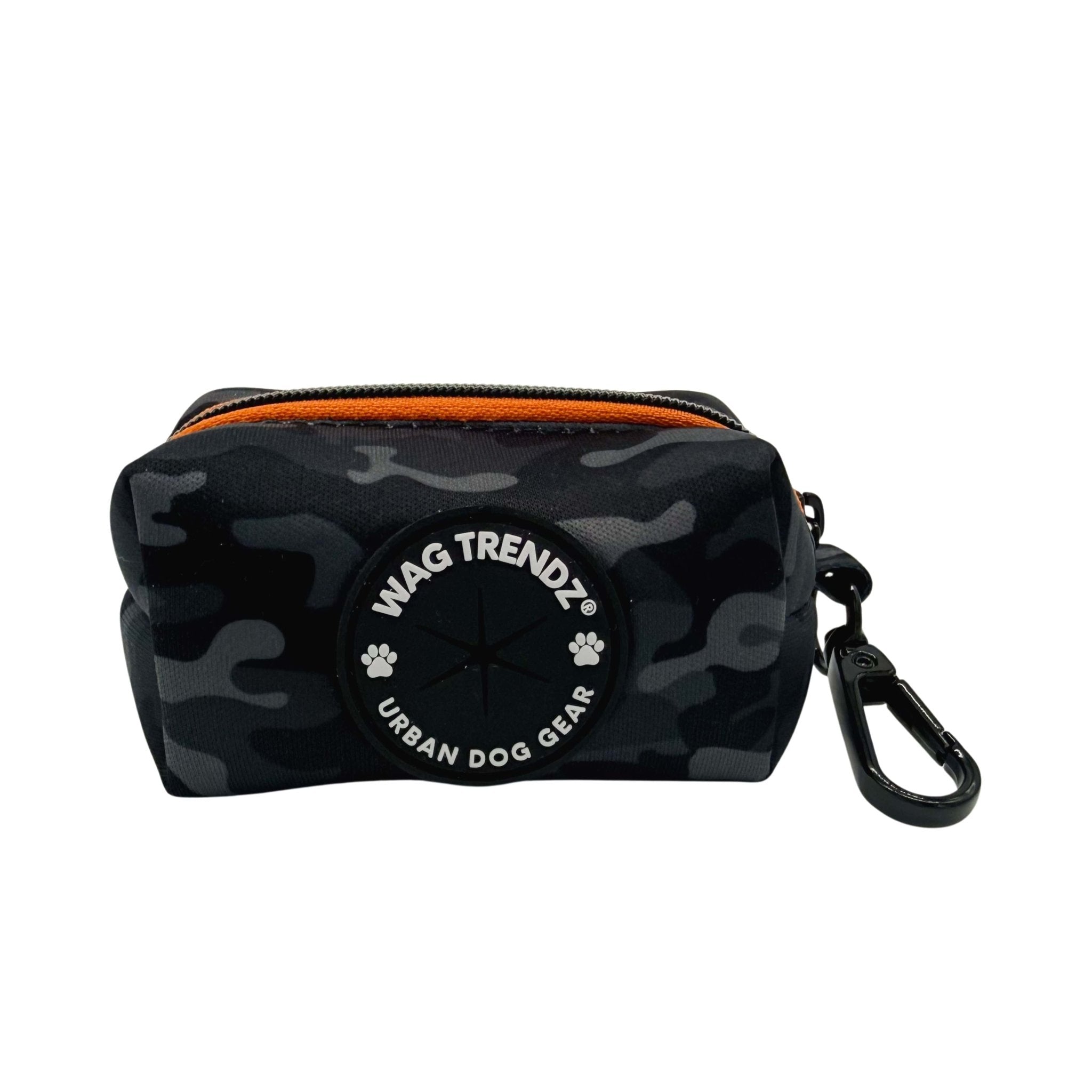 Dog Poop Bag Holder in black and gray camouflage and orange accents with Wag Trendz logo on a white background