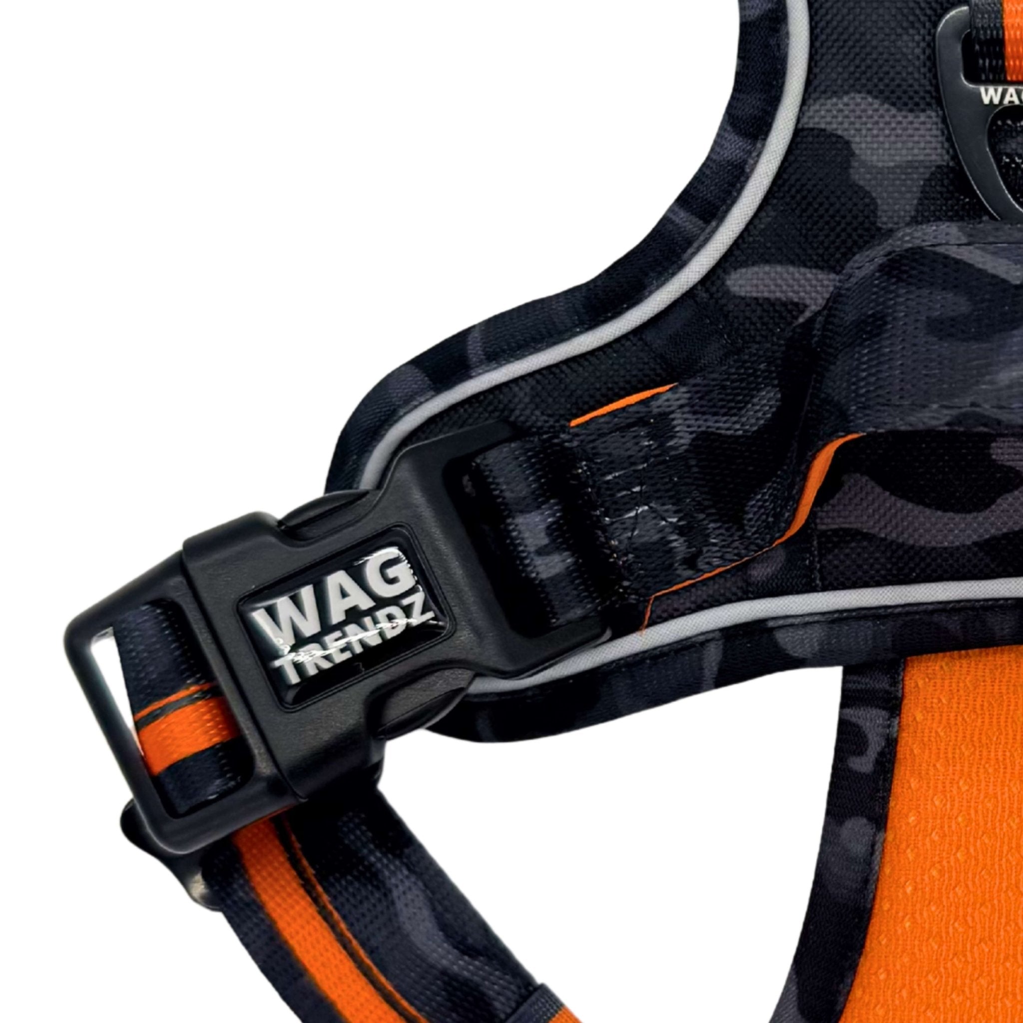 No Pull Dog harness with orange and black camo design and 'WAGTRENDZ' branding on a white background