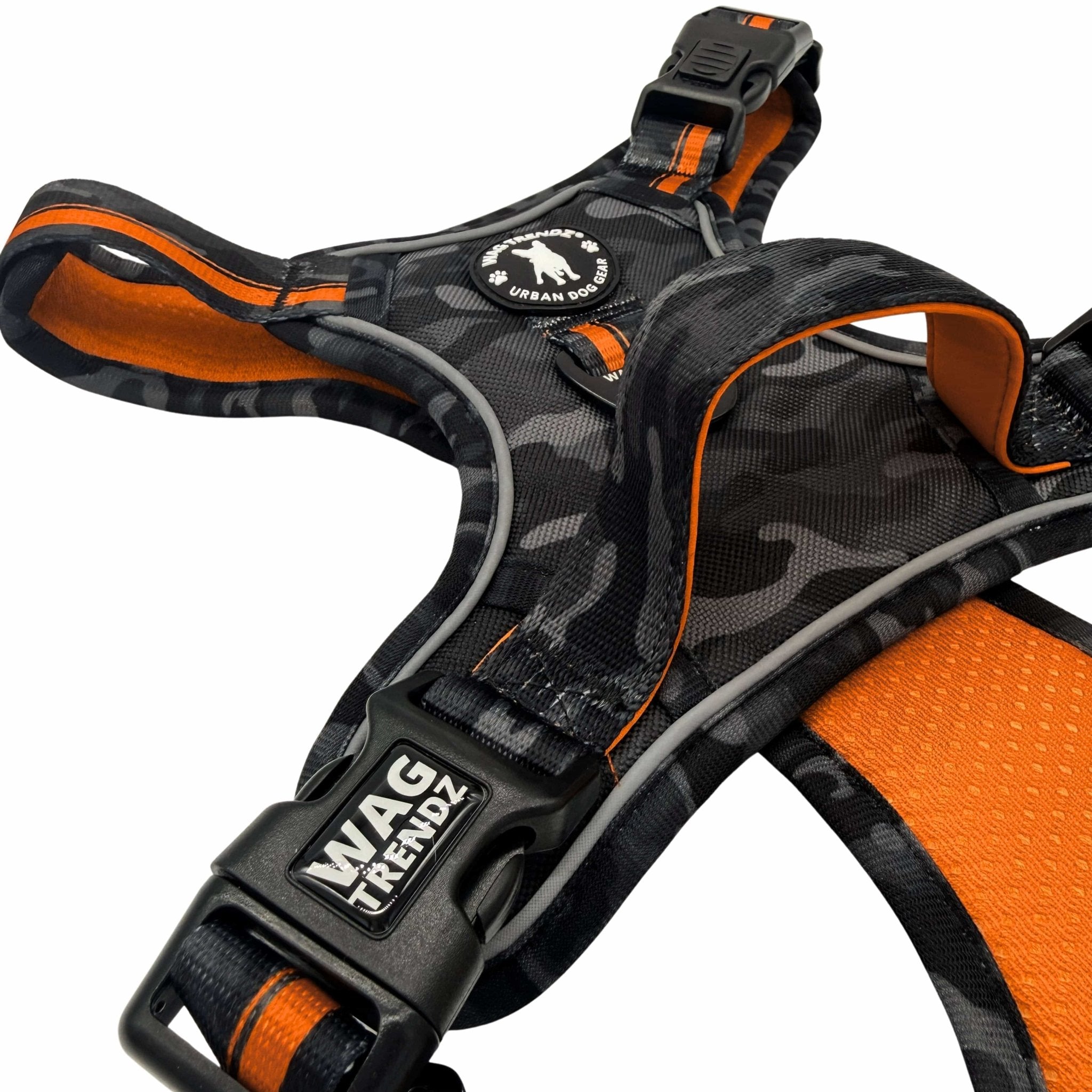 No Pull Dog harness with camouflage pattern and orange accents on a white background